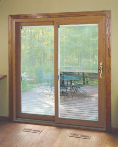 Sliding glass doors that lead out to a deck
